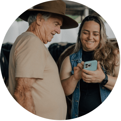 Daughter showing father phone