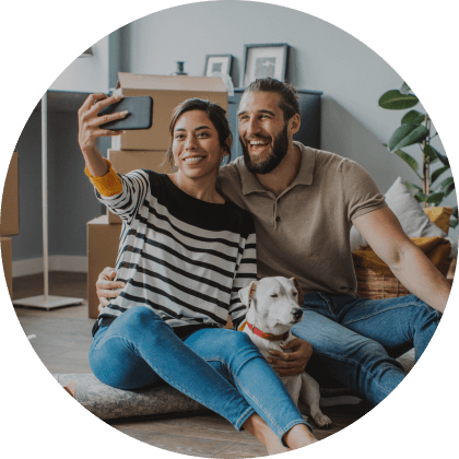 Couple taking selfie in new home